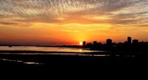 A scenic view of the sun setting within Paraguay.