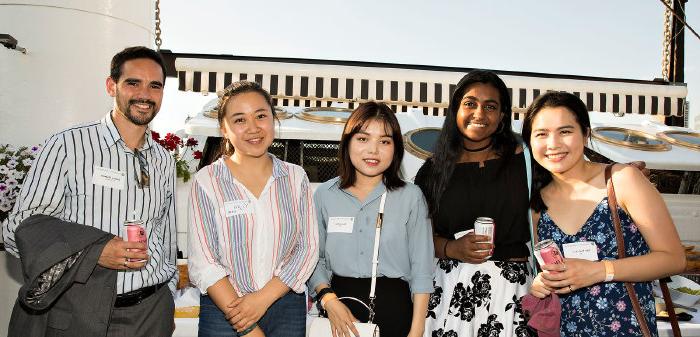 5 people smiling for the camera